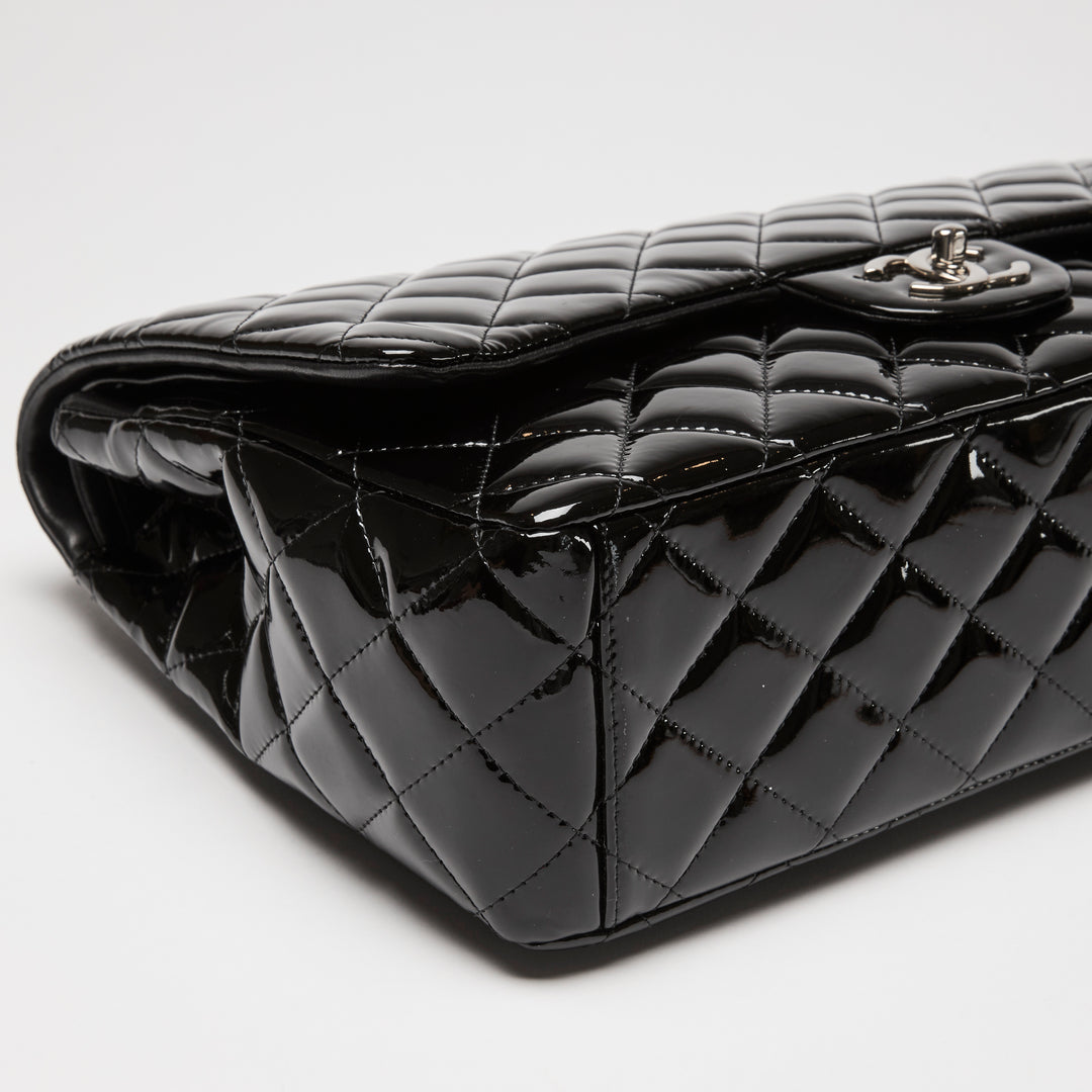 Pre-Loved Chanel™ Black Patent Leather Maxi Classic Double Flap Bag