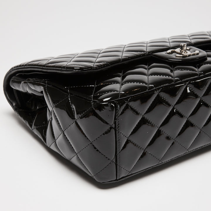 Pre-Loved Chanel™ Black Patent Leather Maxi Classic Double Flap Bag