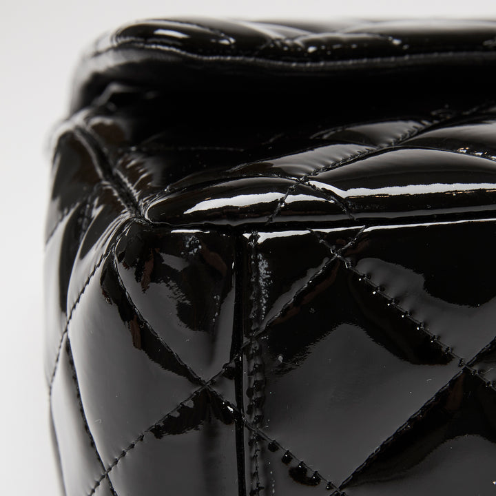 Pre-Loved Chanel™ Black Patent Leather Maxi Classic Double Flap Bag