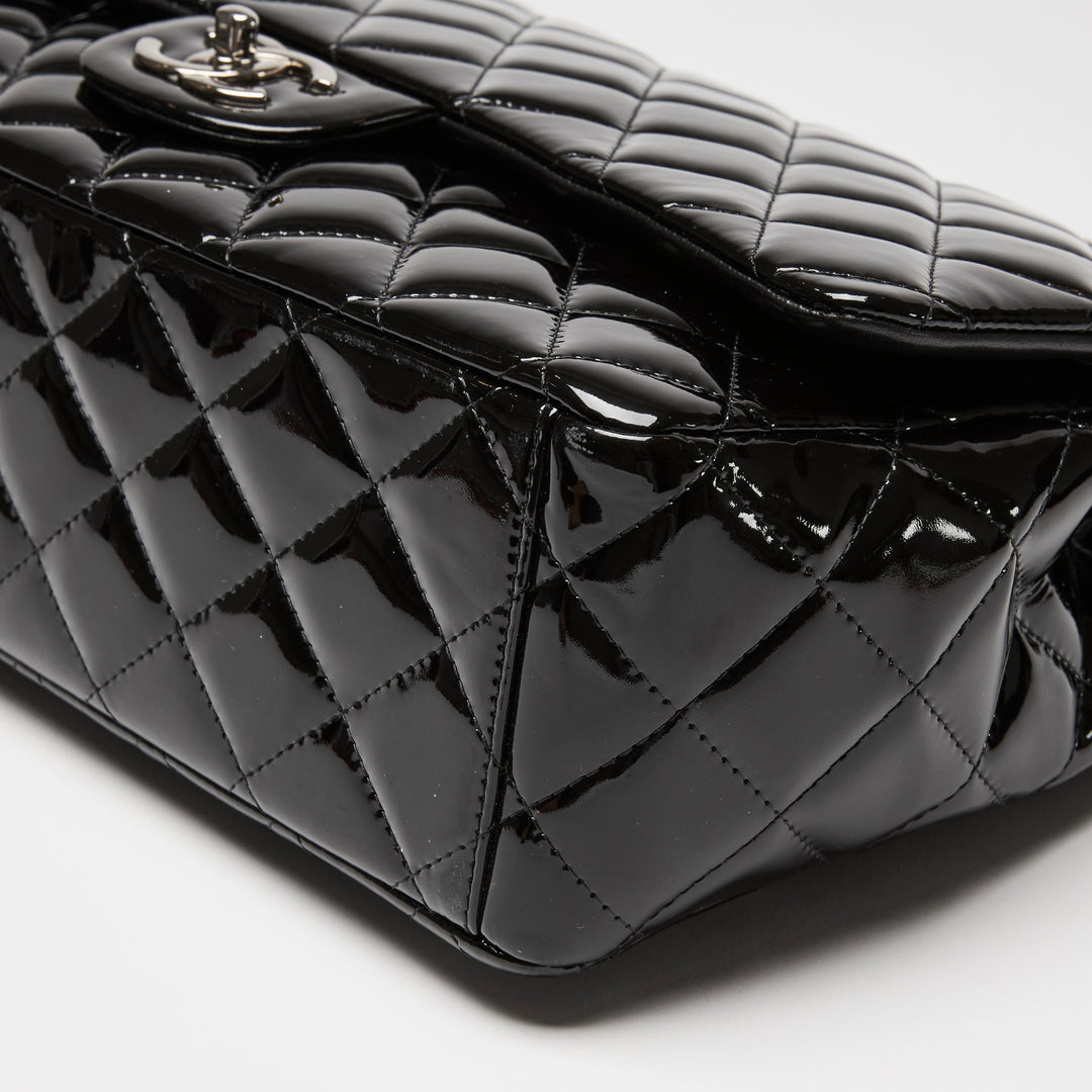 Pre-Loved Chanel™ Black Patent Leather Maxi Classic Double Flap Bag