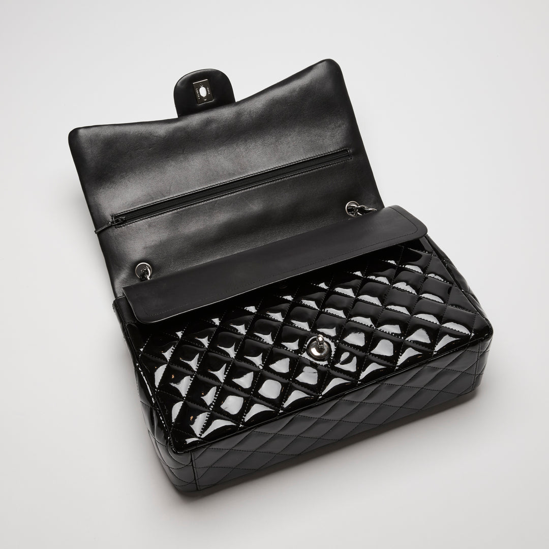 Pre-Loved Chanel™ Black Patent Leather Maxi Classic Double Flap Bag