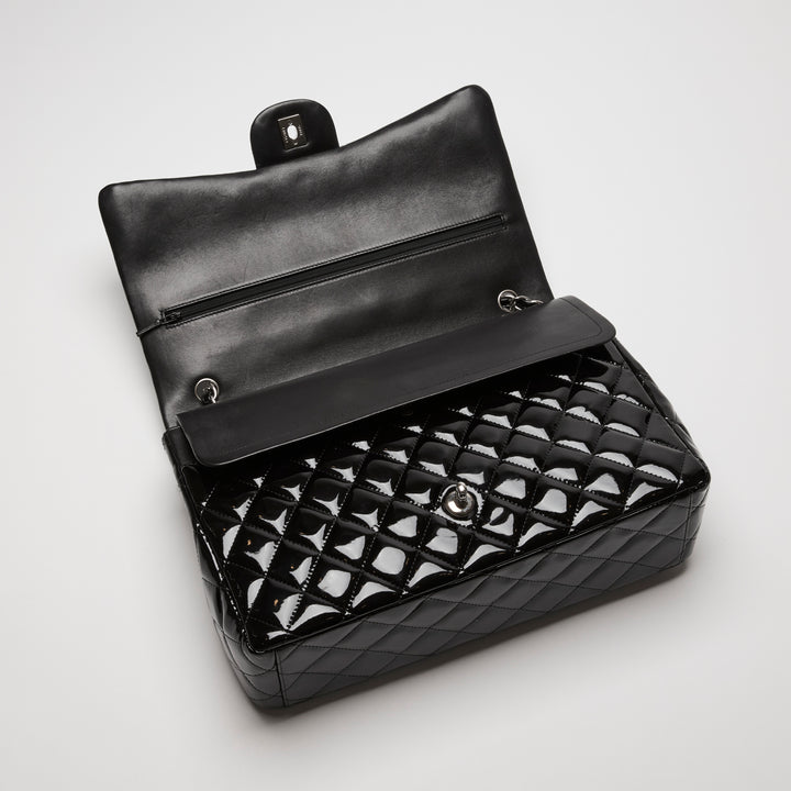 Pre-Loved Chanel™ Black Patent Leather Maxi Classic Double Flap Bag