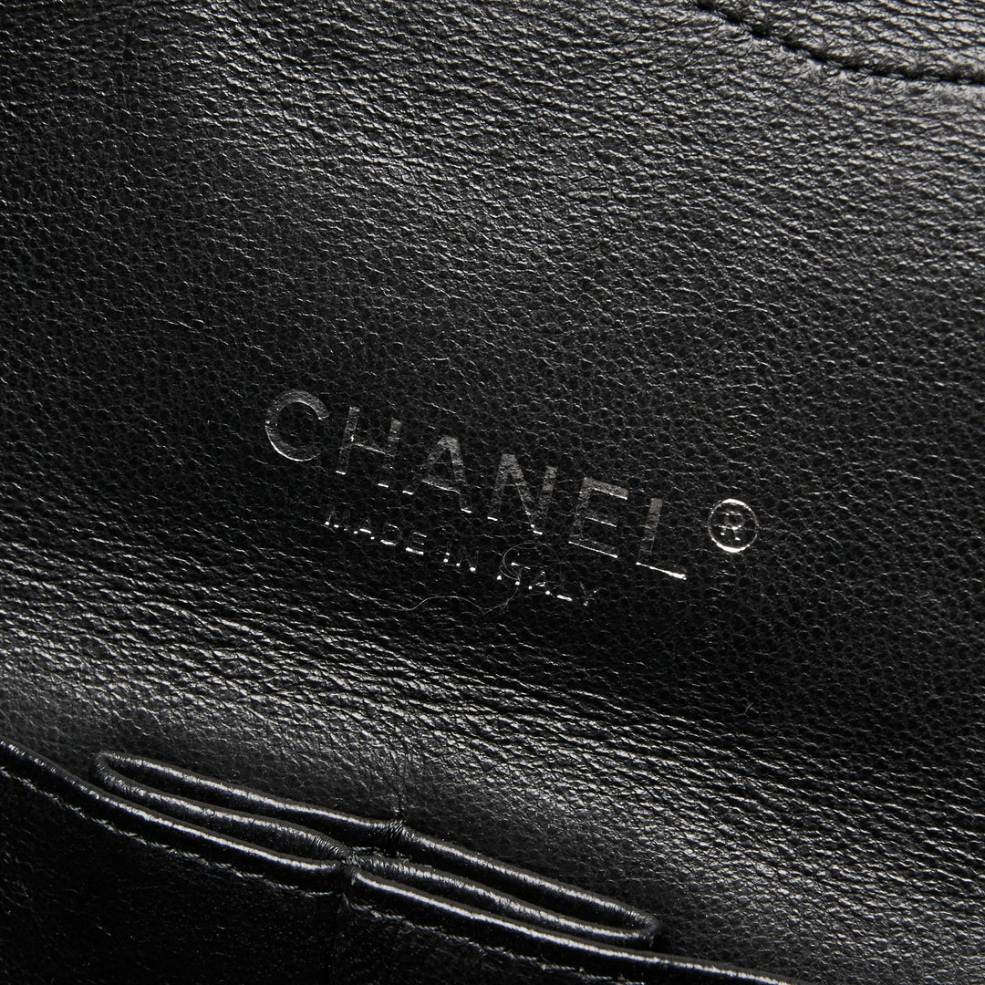 Pre-Loved Chanel™ Black Patent Leather Maxi Classic Double Flap Bag
