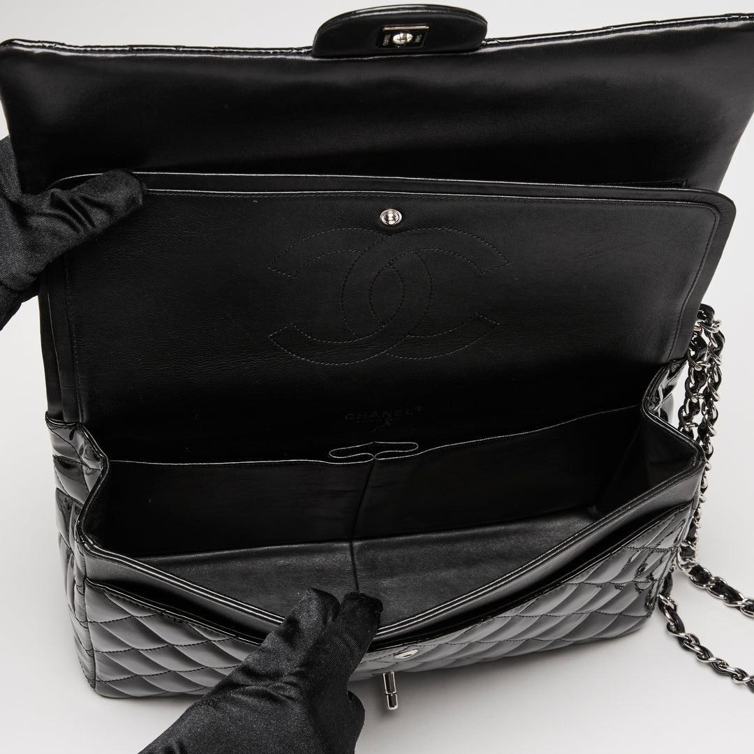 Pre-Loved Chanel™ Black Patent Leather Maxi Classic Double Flap Bag