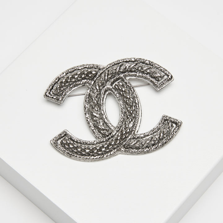 Pre-Loved Chanel™ Silver-Tone Interlocking Logo Brooch