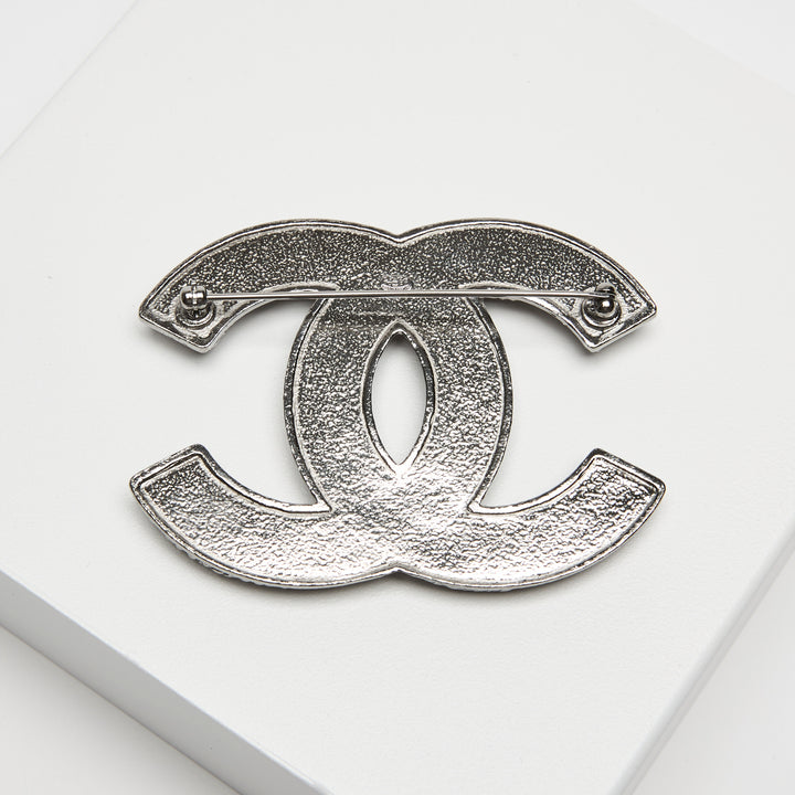 Pre-Loved Chanel™ Silver-Tone Interlocking Logo Brooch