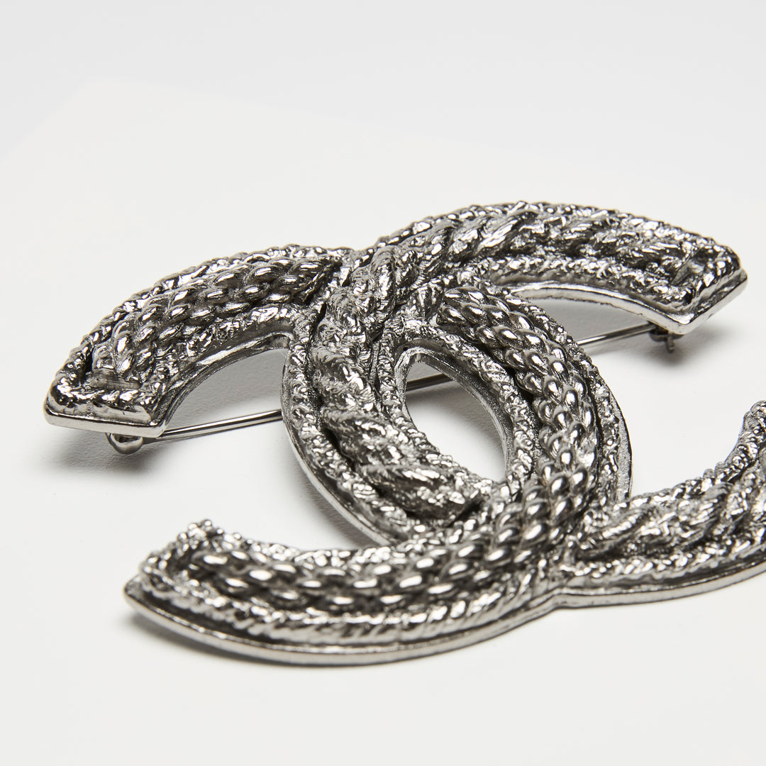 Pre-Loved Chanel™ Silver-Tone Interlocking Logo Brooch