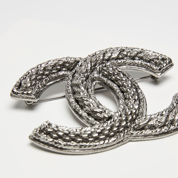 Pre-Loved Chanel™ Silver-Tone Interlocking Logo Brooch