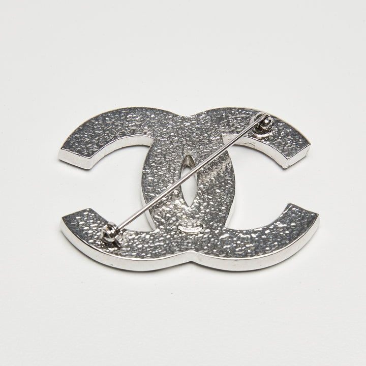 Pre-Loved Chanel™ Silver-Tone Interlocking Logo Brooch