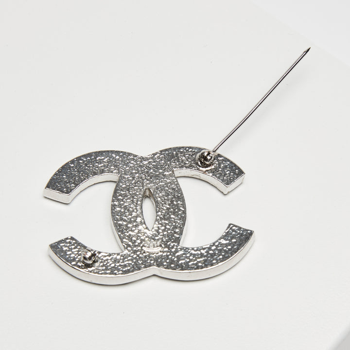 Pre-Loved Chanel™ Silver-Tone Interlocking Logo Brooch