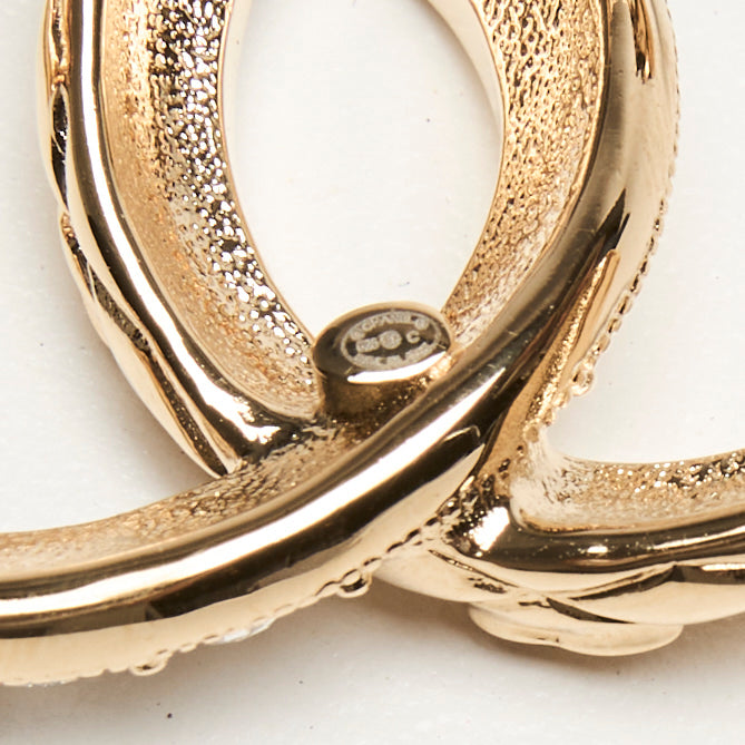 Pre-Loved Chanel™ Gold-Tone Interlaced Black Calf Leather Logo Brooch