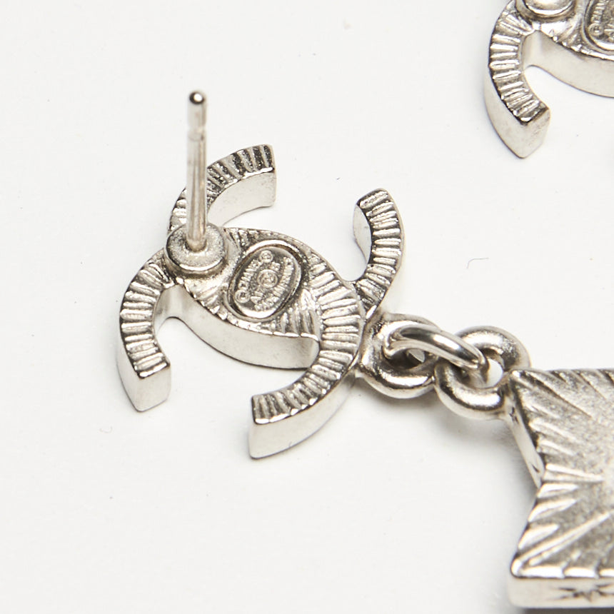 Pre-Loved Chanel™ Silver-Tone & Gunmetal Interlocking Logo Star Drop Earrings