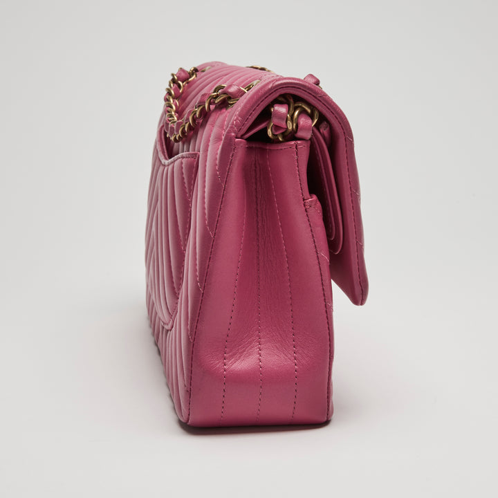 Pre-Loved Chanel™ Pink Chevron Lambskin Leather Medium Classic Double Flap Bag