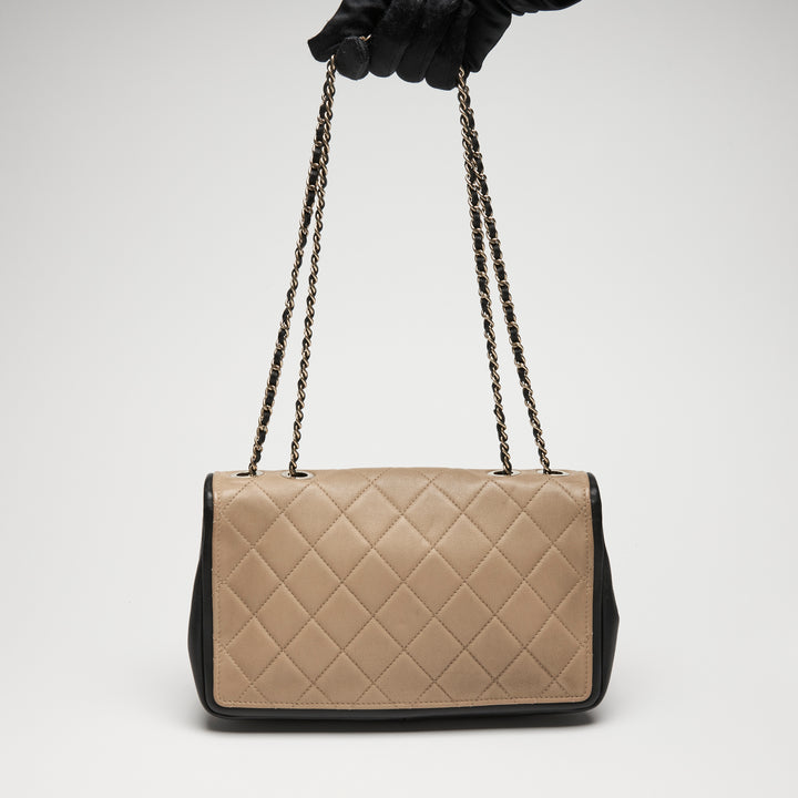 Pre-Loved Chanel™ Beige & Black Quilted Calfskin Leather Medium Graphic Flap Bag
