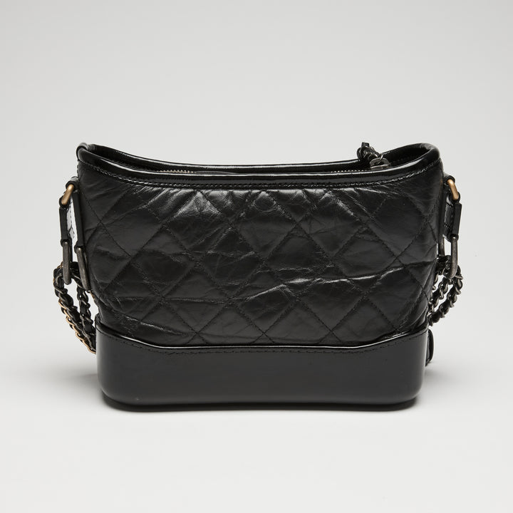 Pre-Loved Chanel™ Black Aged Calfskin Leather Small Gabrielle Bag