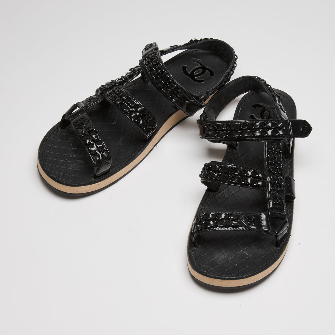 Pre-Loved Chanel™ Black High Gloss Leather Dad Sandals with Chain Detail Size 41