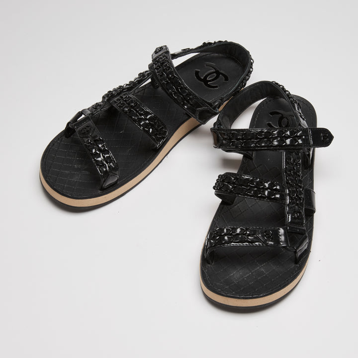 Pre-Loved Chanel™ Black High Gloss Leather Dad Sandals with Chain Detail Size 41