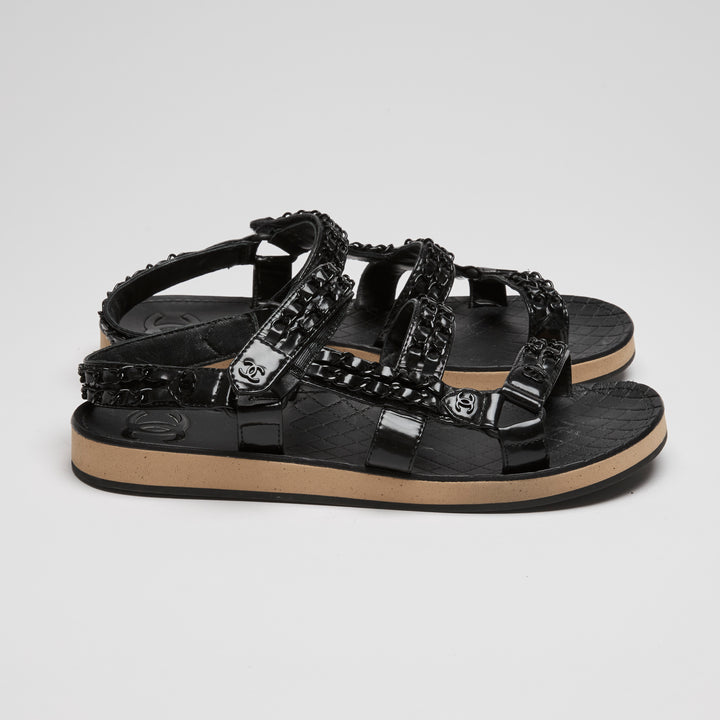 Pre-Loved Chanel™ Black High Gloss Leather Dad Sandals with Chain Detail Size 41