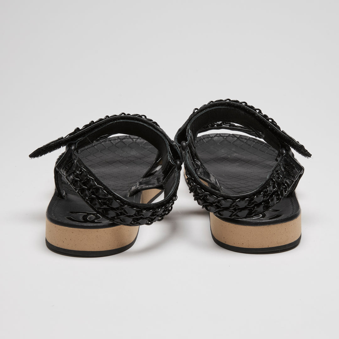 Pre-Loved Chanel™ Black High Gloss Leather Dad Sandals with Chain Detail Size 41