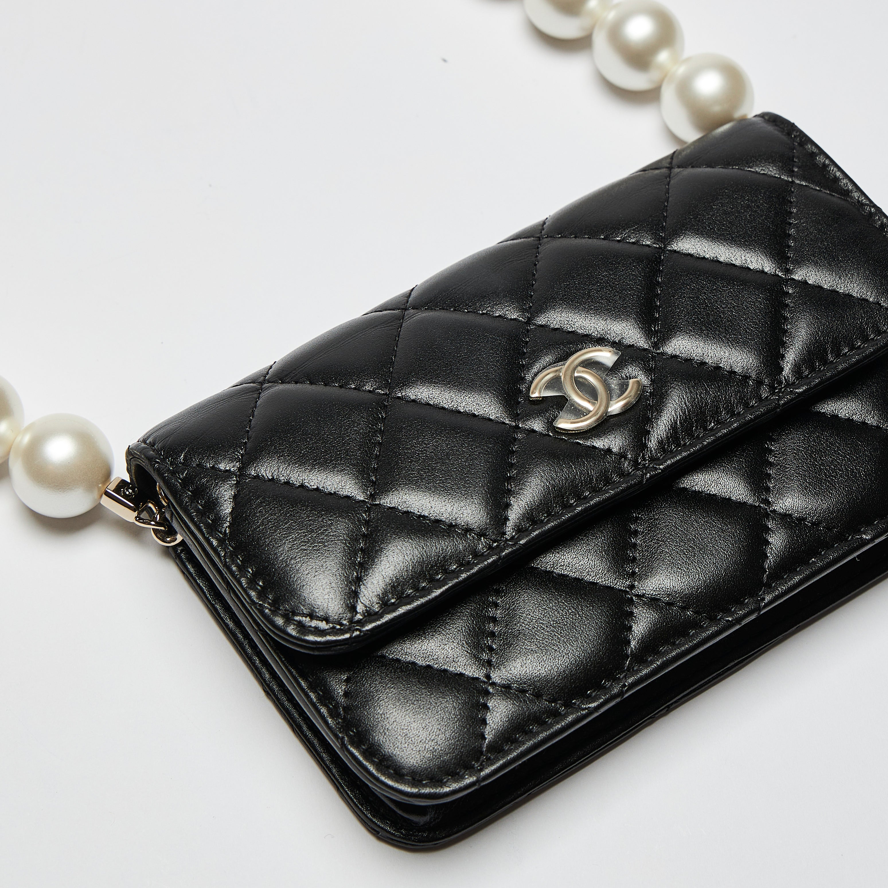Pre Loved Chanel Black Quilted Leather Mini Bag with Oversized Pearl Luxury Finds Consignment