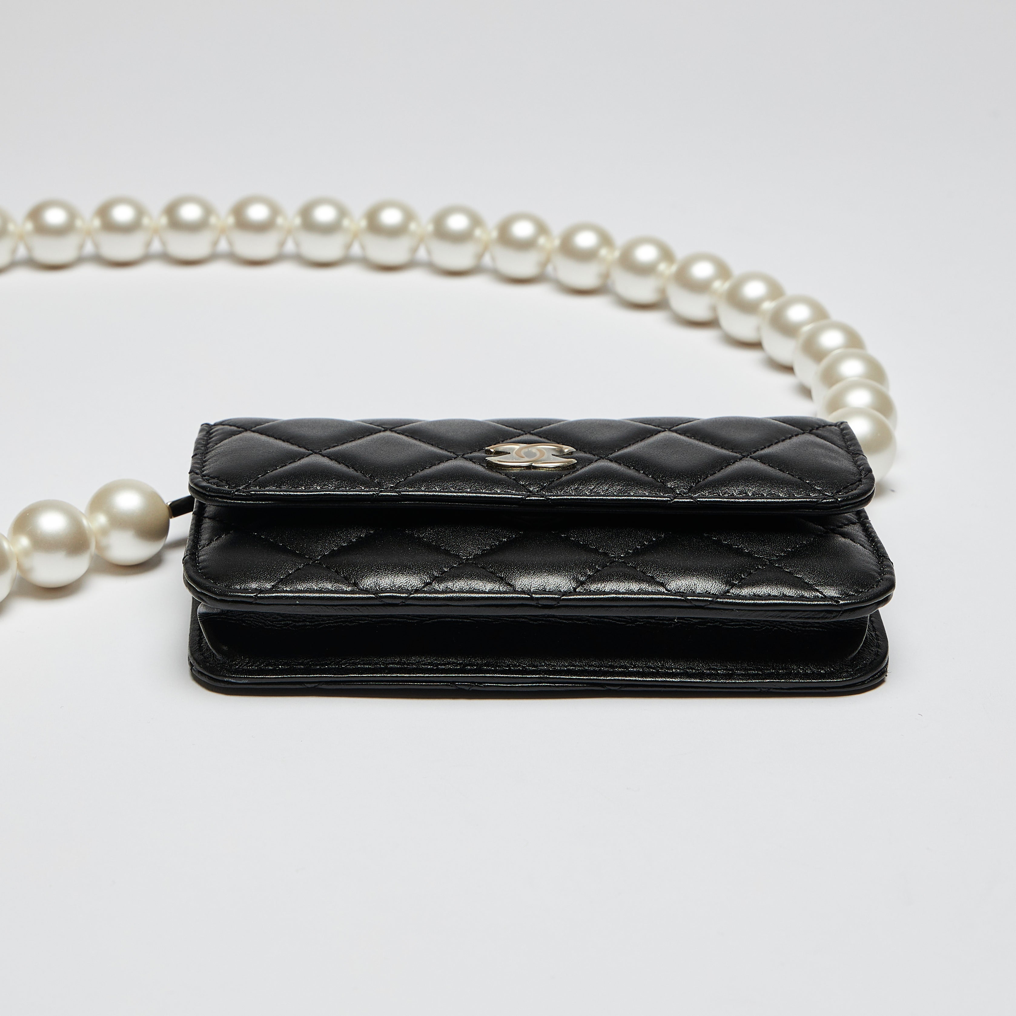 Pre Loved Chanel Black Quilted Leather Mini Bag with Oversized Pearl Luxury Finds Consignment