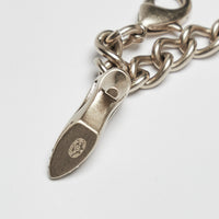 Excellent Pre-Loved Aged Champagne Gold Tone Chain Bracelet with Crystal Embellished iconic Charms.(stamp)