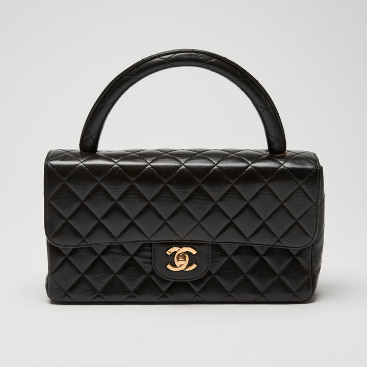 Pre-Loved Chanel™ Black Quilted Lambskin Leather Vintage Top Handle Flap Bag