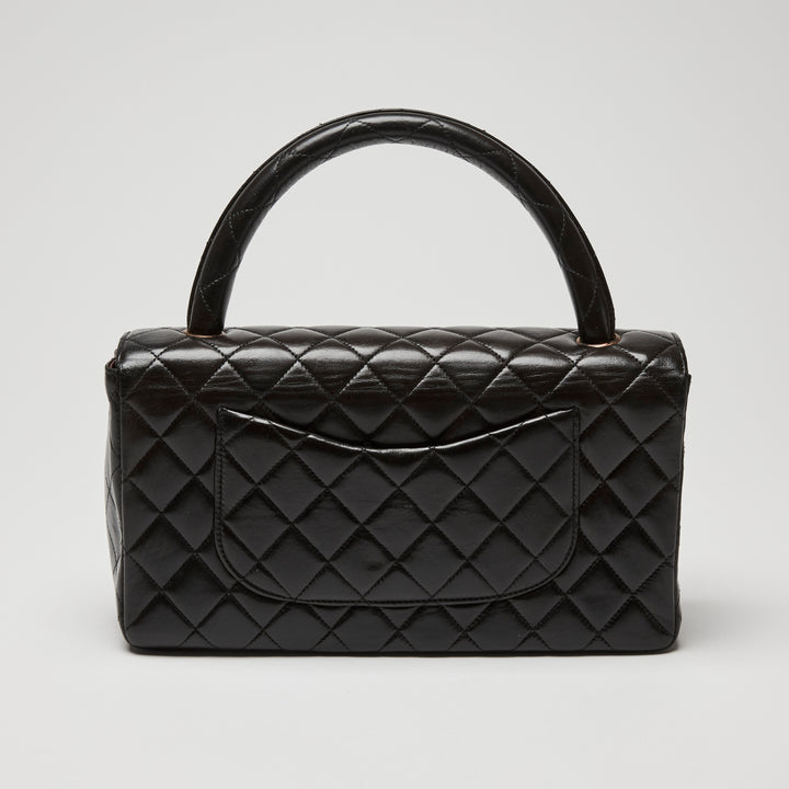 Pre-Loved Chanel™ Black Quilted Lambskin Leather Vintage Top Handle Flap Bag