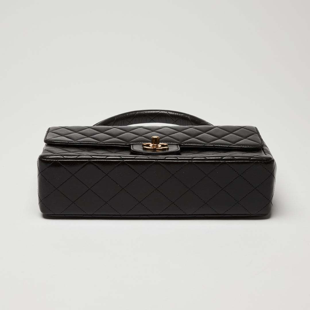 Pre-Loved Chanel™ Black Quilted Lambskin Leather Vintage Top Handle Flap Bag