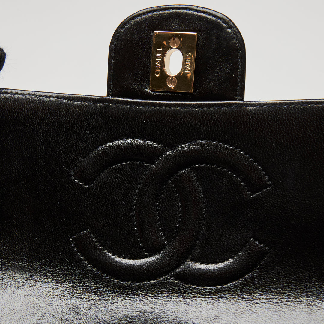 Pre-Loved Chanel™ Black Quilted Lambskin Leather Vintage Top Handle Flap Bag
