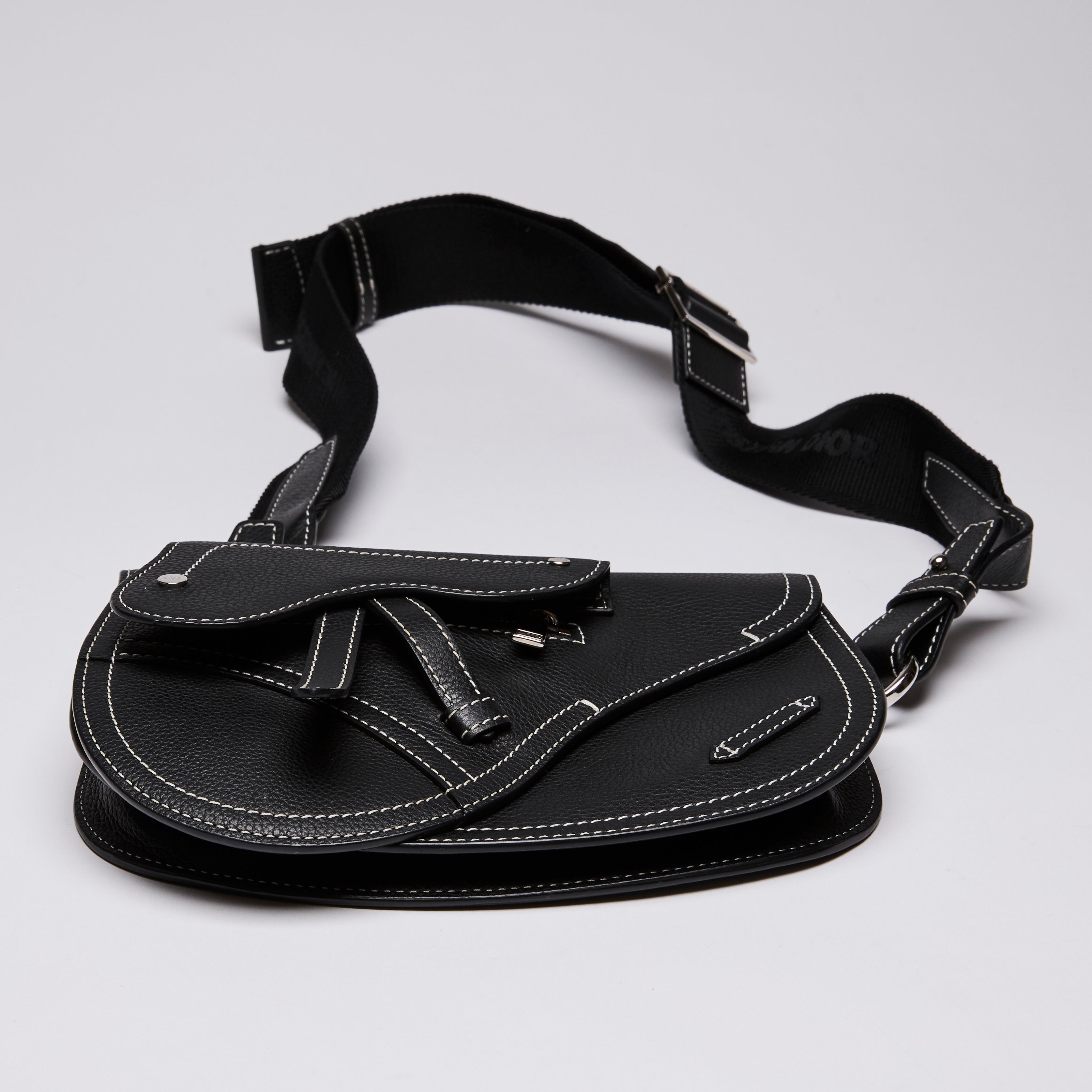 Dior X KAWS Small Black Pebbled Leather Saddle Bag with