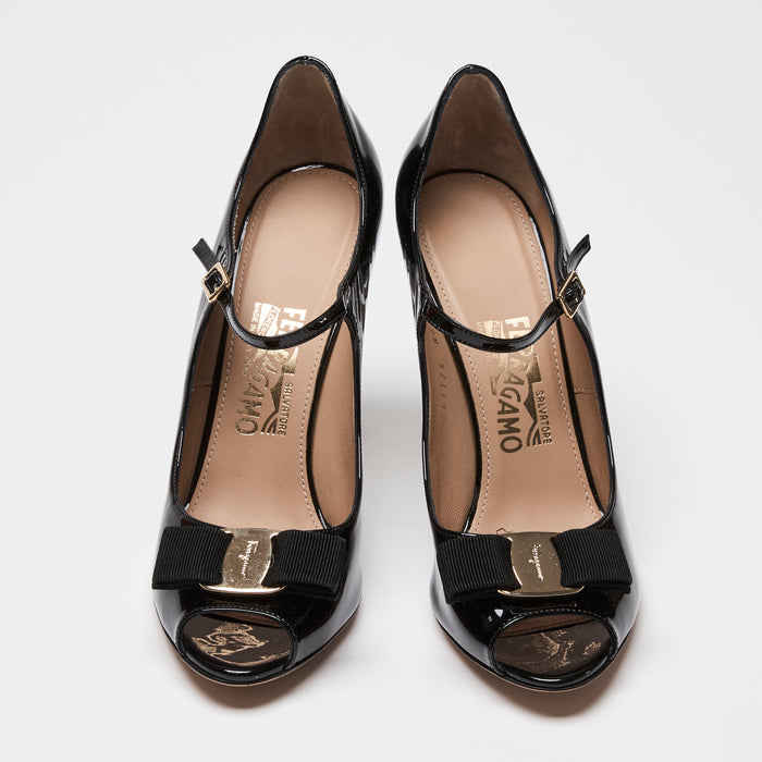 Ferragamo black high-heeled shoes with bow details and leather strap