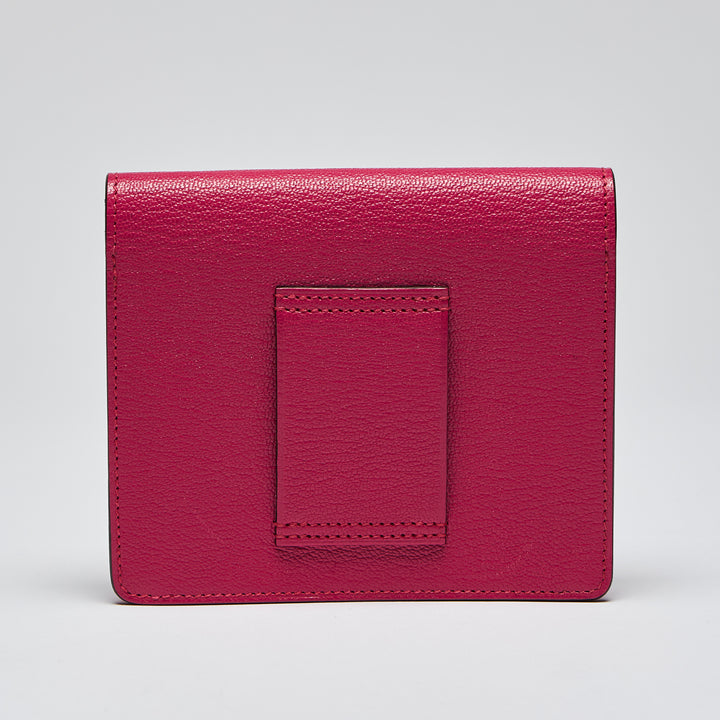 Excellent Pre-Loved Magenta Pink Grained Leather Flap Compact Wallet.(back)