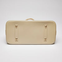 Pre-Loved Large Monogram Embossed Ivory Patent Leather Half Dome Shaped Top Handle Bag. (bottom)