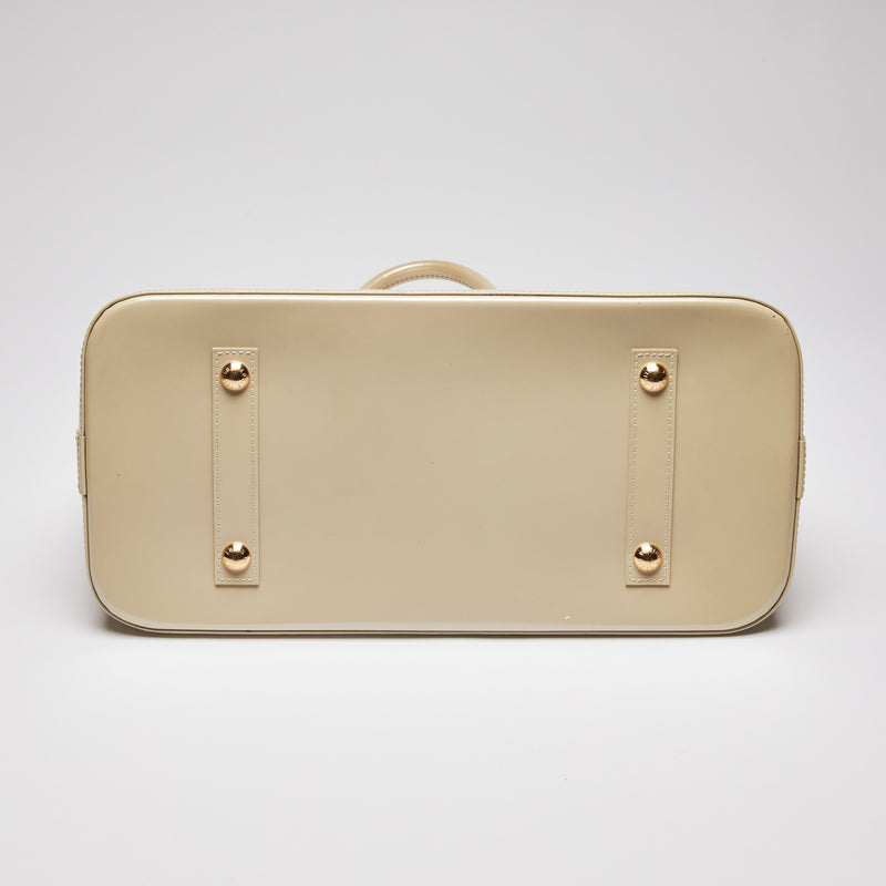 Pre-Loved Large Monogram Embossed Ivory Patent Leather Half Dome Shaped Top Handle Bag. (bottom)