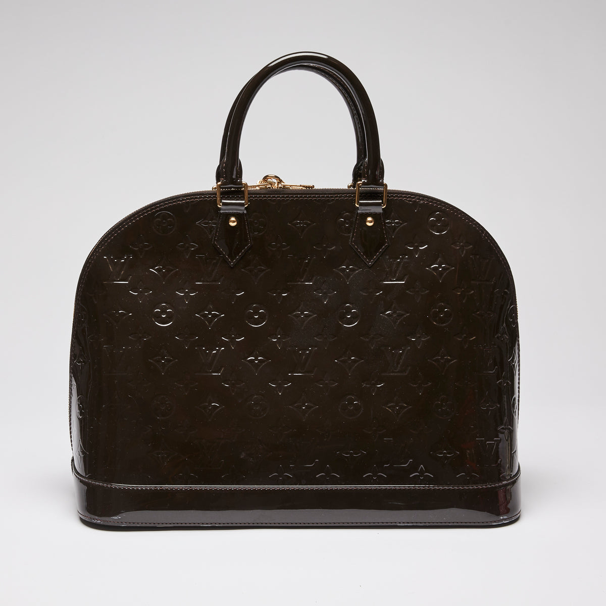 Pre-Loved Dark Plum Monogram Embossed Patent Leather Top Handle Bag.  (Back)