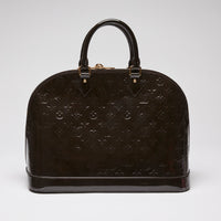 Pre-Loved Dark Plum Monogram Embossed Patent Leather Top Handle Bag.  (Back)
