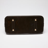 Pre-Loved Dark Plum Monogram Embossed Patent Leather Top Handle Bag. (bottom)