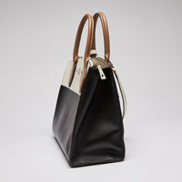 Excellent Pre-Loved Ivory/Dark Beige/Black Smooth Leather Top Handle Bag. (side)