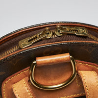 Pre-Loved Coated Canvas Monogram Round Shaped Zip Top Backpack.(zipper pull)