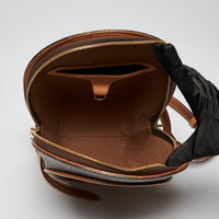 Pre-Loved Coated Canvas Monogram Round Shaped Zip Top Backpack.(interior)