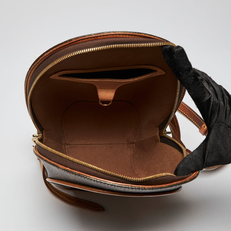 Pre-Loved Coated Canvas Monogram Round Shaped Zip Top Backpack.(interior)