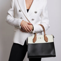 Excellent Pre-Loved Ivory/Dark Beige/Black Smooth Leather Top Handle Bag. (on body)