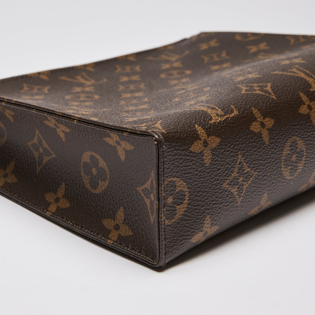 Excellent Pre-Loved Monogram Coated Canvas Toiletry Pouch.  (corner)