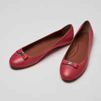 Pair of Mulberry red flat ballet shoes with a bow detail