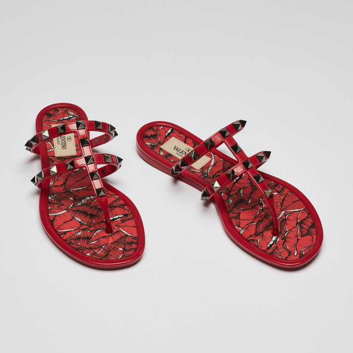Pre-Loved Red Jelly Dark Silver Tone Studded Thong Sandals.(front)