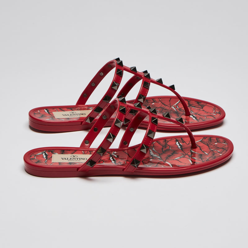 Pre-Loved Red Jelly Dark Silver Tone Studded Thong Sandals.(side)