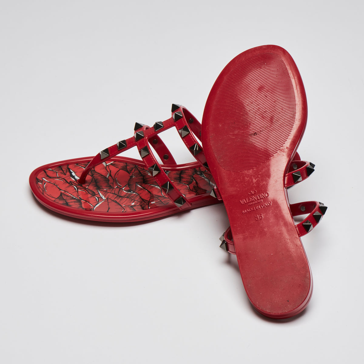 Pre-Loved Red Jelly Dark Silver Tone Studded Thong Sandals.(bottom)
